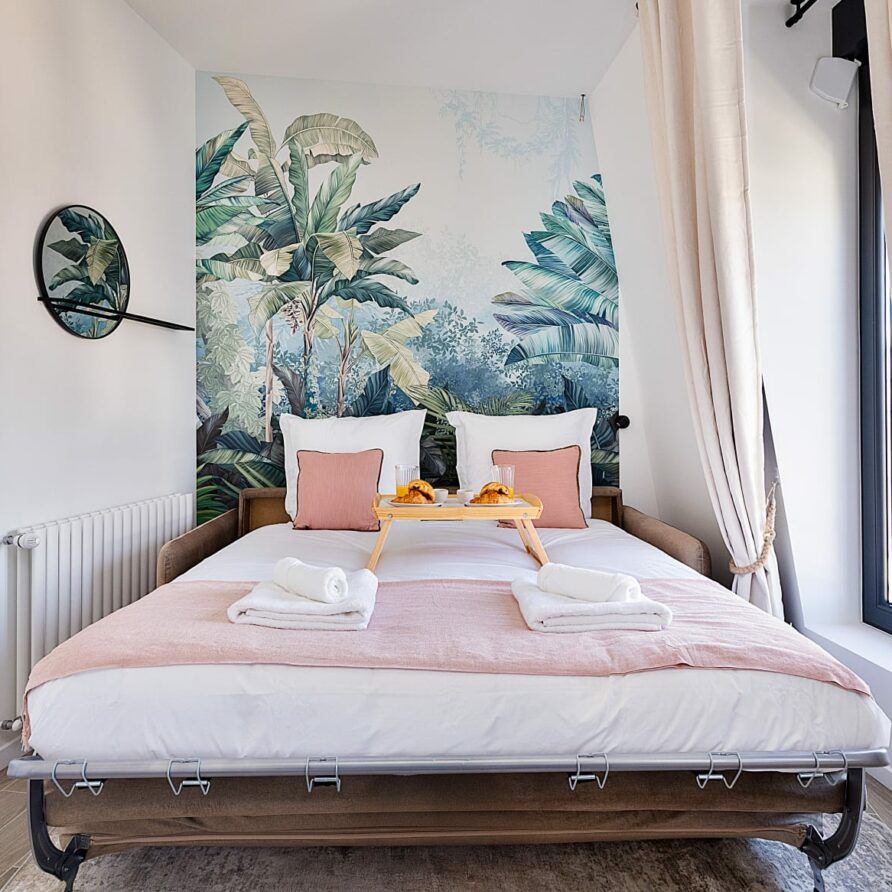 Lit double confortable du studio 3.1 à Paris